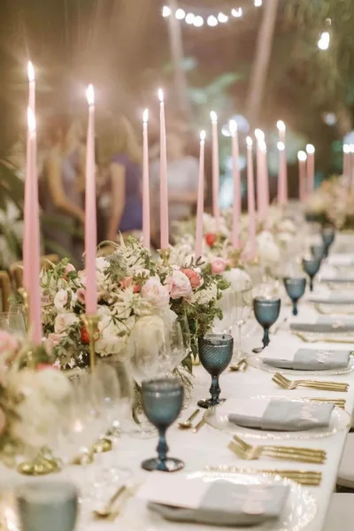 A candlelit table setting